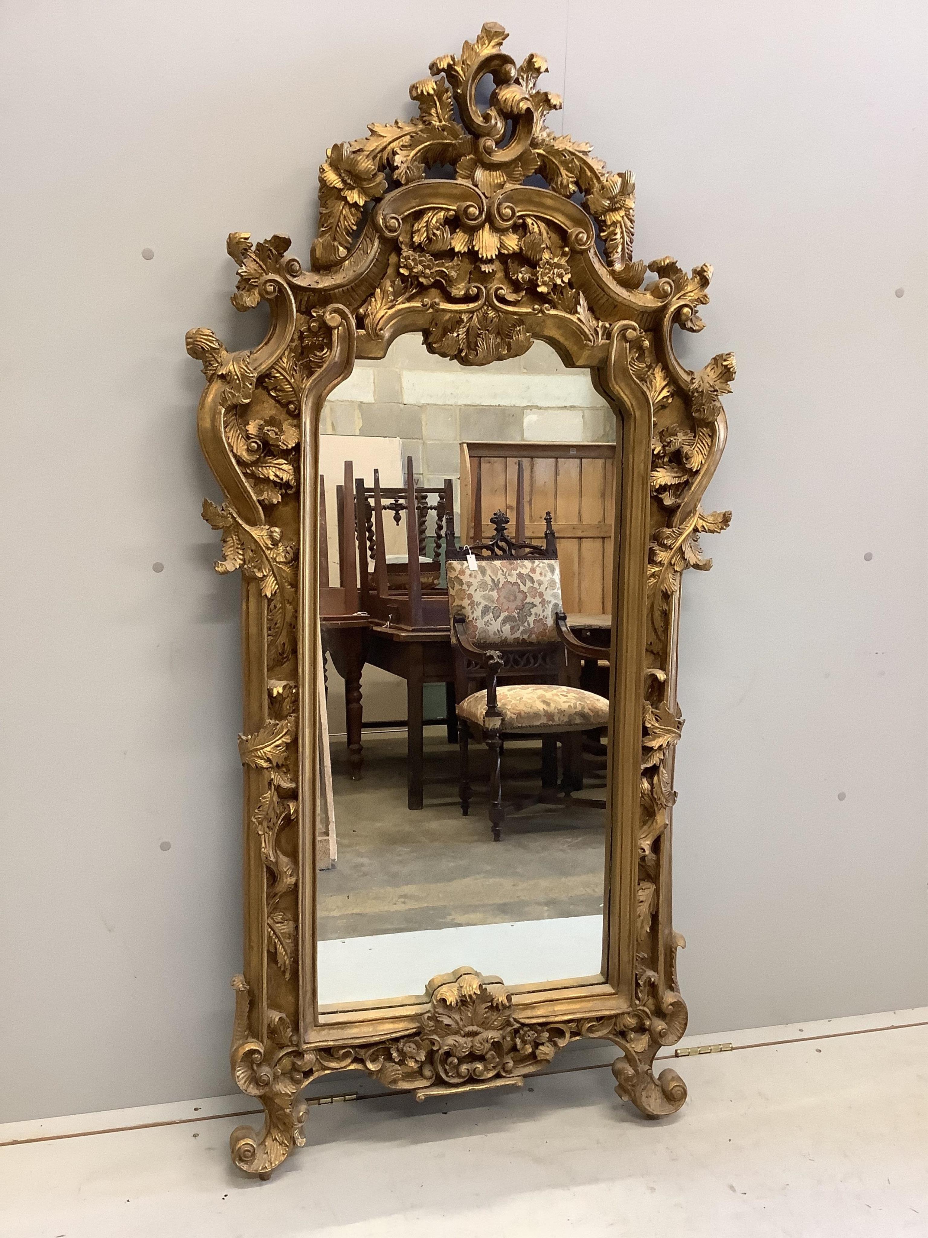 A Victorian style gilt composition wall mirror, width 82cm, height 165cm
